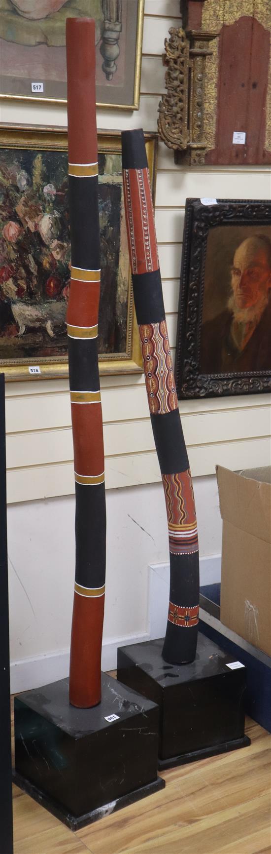 Two Aboriginal staffs and an ethnographic tall wood figure, H.210cm